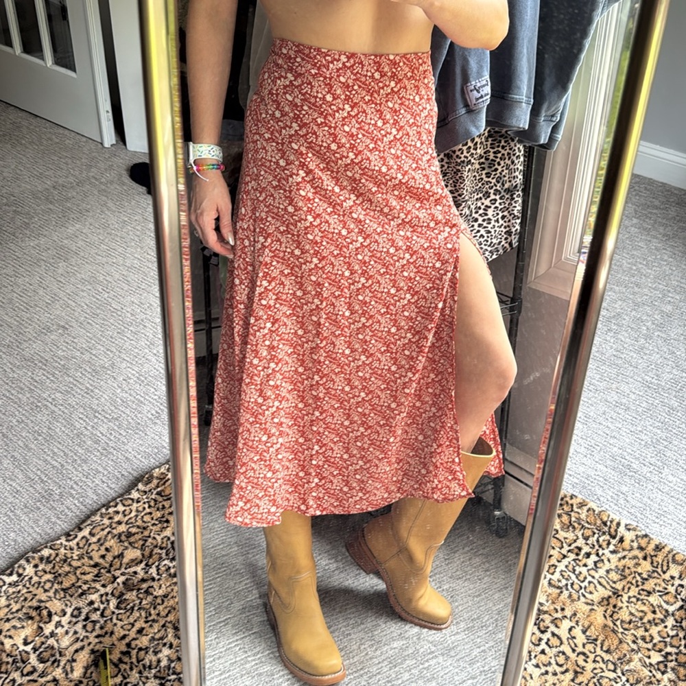 Orange floral skirt with slit to thigh. Reformation style
